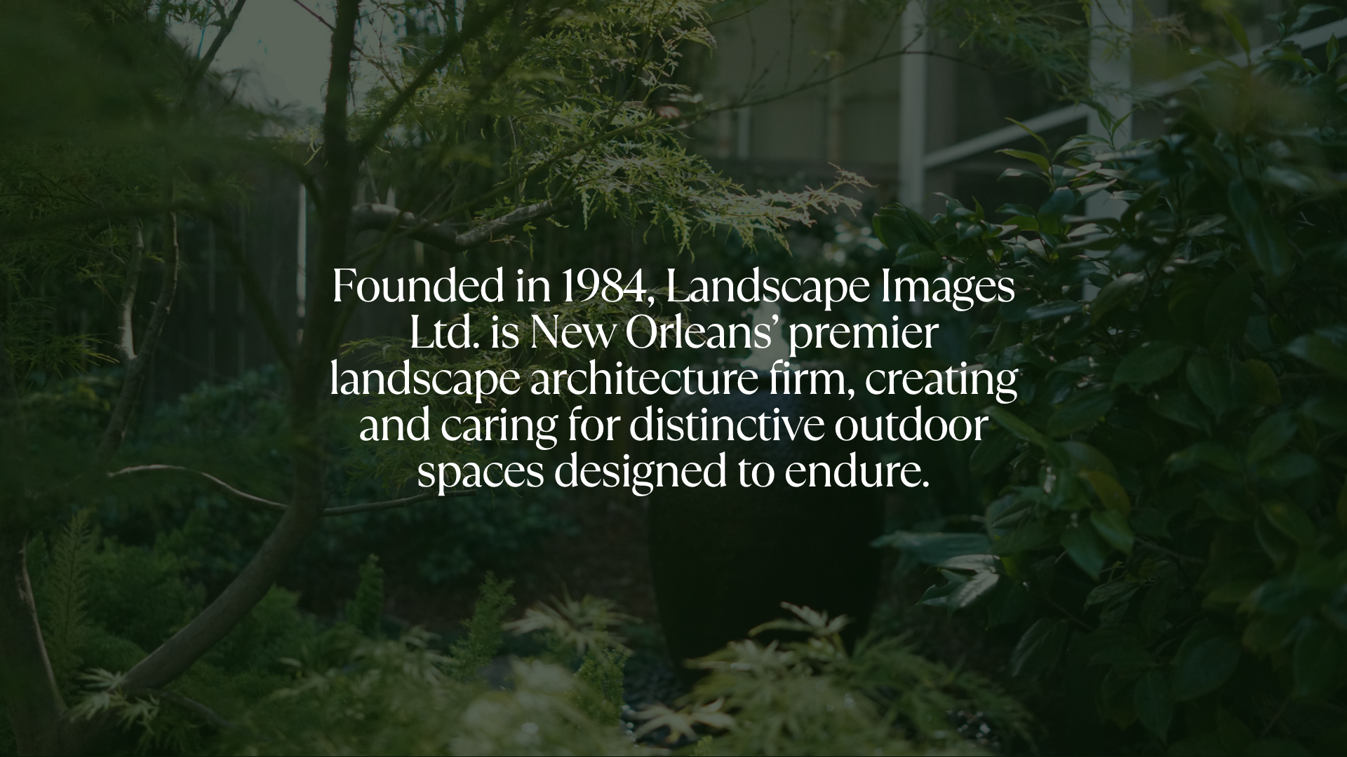 Lush New Orleans garden illustrating Landscape Images Ltd.’s landscape architecture and long-term garden care.